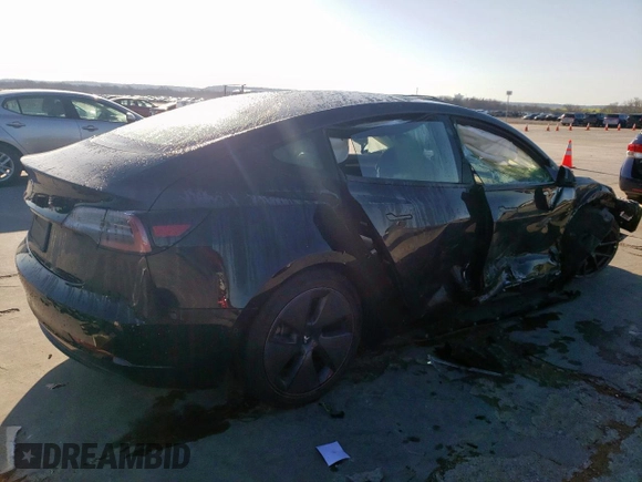 2021 Tesla Model 3 Standard Range Plus with VIN 5YJ3E1EA2MF977007, listed as a Copart auction lot 48516075 with Not Provided miles and Salvage Title. Bid and sale history available at DreamBid. Image 3.