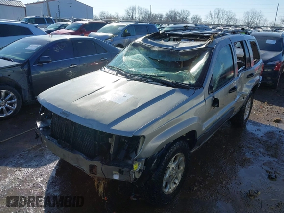 2001 Jeep Grand Cherokee Laredo with VIN 1J4GX48S51C735316, listed as a IAAI auction lot 41752349 with 214,101 mi miles and . Bid and sale history available at DreamBid. Image 6.