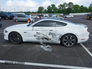 2019 Ford Mustang GT z VIN 1FA6P8CF6K5173649, wystawiony jako IAAI lot #42172829 z przebiegiem 85 346 mil mil oraz . Historia ofert i sprzedaży dostępna na DreamBid. Obrazek 14.
