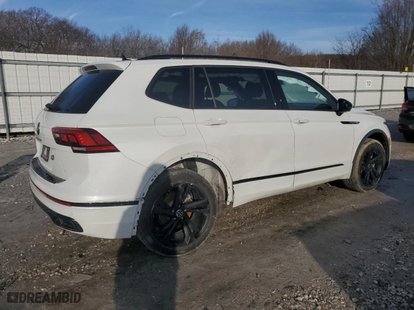2023 Volkswagen Tiguan SE R-Line Black with VIN 3VVCB7AX8PM121086, listed as a Copart auction lot 45601555 with 27,571 mi miles and Salvage Title. Bid and sale history available at carsss.com. Image 3.