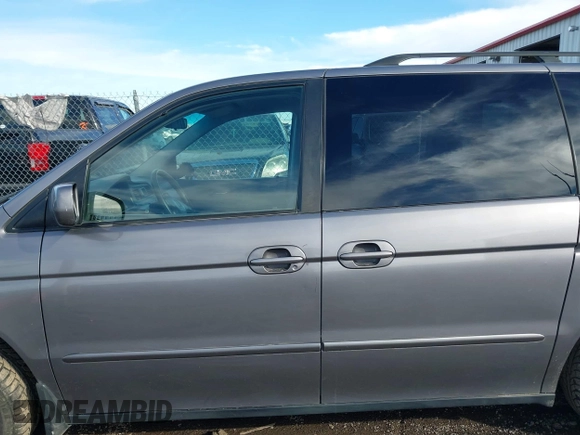 2000 Honda Odyssey EX with VIN 2HKRL1863YH621471, listed as a IAAI auction lot 41702650 with 167,050 mi miles and . Bid and sale history available at DreamBid. Image 14.