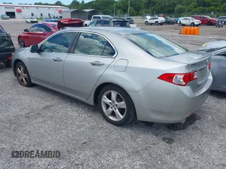 2010 Acura TSX with VIN JH4CU2F66AC022656, listed as a IAAI auction lot 42579045 with 222,313 mi miles and . Bid and sale history available at DreamBid. Image 3.