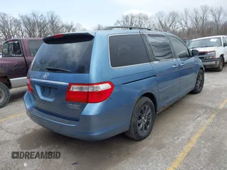 2005 Honda Odyssey TOURING with VIN 5FNRL38815B048075, listed as a IAAI auction lot 41813377 with 259,138 mi miles. Bid and sale history available at carsss.com. Image 4.