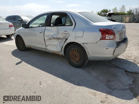 2009 Toyota Yaris with VIN JTDBT903391300394, listed as a Copart auction lot 53392945 with 227,210 mi miles and Salvage Title. Bid and sale history available at DreamBid. Image 2.