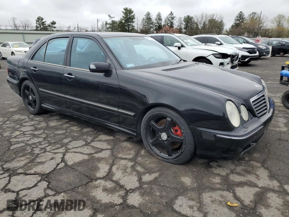 2002 Mercedes-Benz E with VIN WDBJF74J22B408004, listed as a Copart auction lot 52701805 with 240,246 mi miles and Clean Title. Bid and sale history available at DreamBid. Image 4.