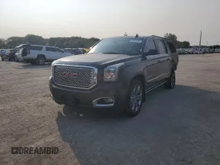 2015 GMC Yukon XL Denali with VIN 1GKS2JKJ4FR636332, listed as a Copart auction lot 70721314 with 0 mi miles and Salvage Title. Bid and sale history available at carsss.com. Image 1.