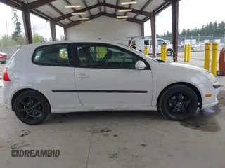 2007 Volkswagen Rabbit z VIN WVWBR71K67W191437, wystawiony jako IAAI lot #42082924 z przebiegiem 183 154 mil mil oraz . Historia ofert i sprzedaży dostępna na DreamBid. Obrazek 13.