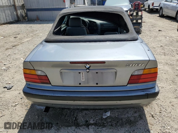 1994 BMW 3 Series 318iC with VIN WBABK6329RED16256, listed as a Copart auction lot 67191674 with 113,073 mi miles and Salvage Title. Bid and sale history available at carsss.com. Image 6.