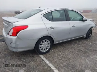 2015 Nissan Versa S Plus with VIN 3N1CN7AP0FL810844, listed as a IAAI auction lot 41386594 with 118,606 mi miles. Bid and sale history available at carsss.com. Image 4.