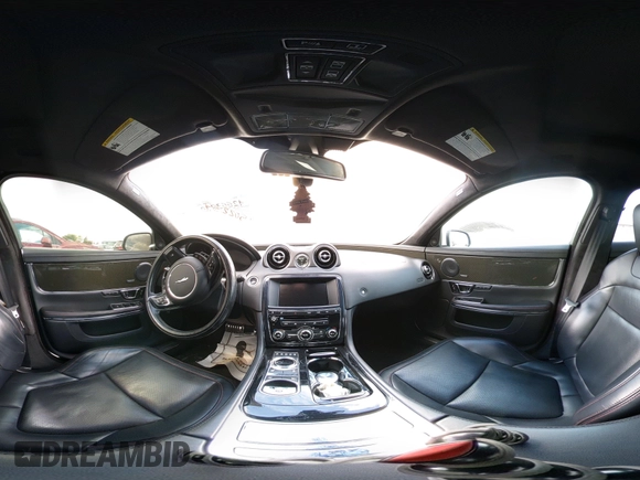 2014 Jaguar XJ R with VIN SAJWA1EK3EMV58692, listed as a IAAI auction lot 42663979 with 111,386 mi miles and . Bid and sale history available at DreamBid. Image 18.