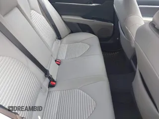 2018 Toyota Camry LE z VIN 4T1B11HK7JU033701, wystawiony jako IAAI lot #42417229 z przebiegiem 49 977 mil mil oraz . Historia ofert i sprzedaży dostępna na DreamBid. Obrazek 8.