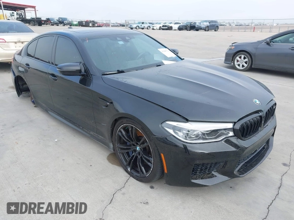 2019 BMW M5 z VIN WBSJF0C51KB447804, wystawiony jako IAAI lot #41848760 z przebiegiem 83 303 mil mil oraz . Historia ofert i sprzedaży dostępna na DreamBid. Obrazek 1.
