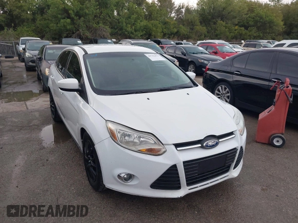 2012 Ford Focus SE z VIN 1FAHP3F29CL141649, wystawiony jako IAAI lot #40782821 z przebiegiem 266 683 mil mil oraz . Historia ofert i sprzedaży dostępna na DreamBid. Obrazek 1.