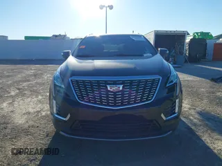 2024 Cadillac XT5 FWD Premium Luxury with VIN 1GYKNCRS4RZ729461, listed as a IAAI auction lot 41411300 with 5,760 mi miles. Bid and sale history available at carsss.com. Image 12.