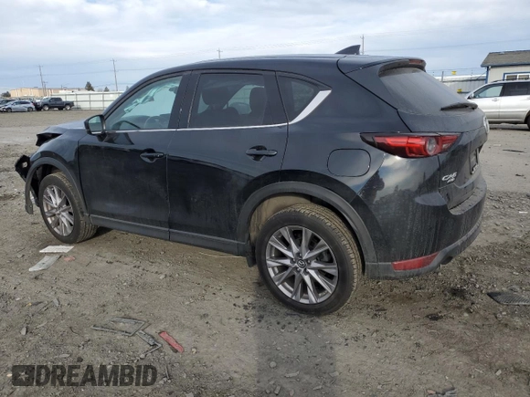 2019 Mazda CX-5 Grand Touring with VIN JM3KFBDM9K1650840, listed as a Copart auction lot 41929185 with 61,814 mi miles and Salvage Title. Bid and sale history available at carsss.com. Image 2.