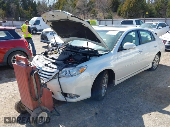 2012 Toyota Avalon with VIN 4T1BK3DB2CU463685, listed as a IAAI auction lot 41761299 with 72,934 mi miles and . Bid and sale history available at DreamBid. Image 2.