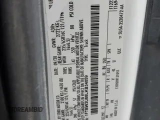 2020 Ford Transit Cargo with VIN 1FTBW3U88LKB34059, listed as a Copart auction lot 57055695 with 77,813 mi miles and Clean title. Bid and sale history available at DreamBid. Image 13.