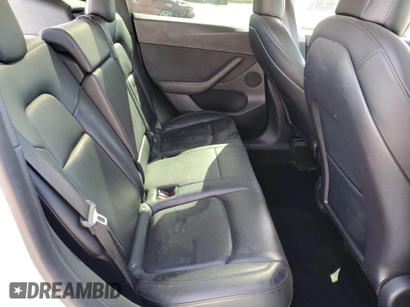2021 Tesla Model Y Long Range z VIN 5YJYGDEE5MF275302, wystawiony jako Copart lot #54353875 z przebiegiem 63 196 mil mil oraz Szkoda całkowita • Salvage title. Historia ofert i sprzedaży dostępna na DreamBid. Obrazek 10.