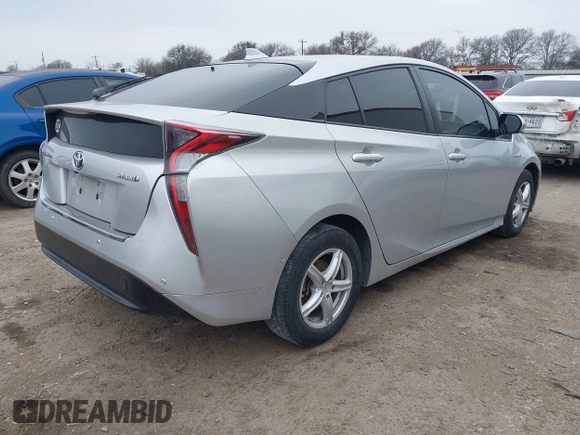 2018 Toyota Prius Two with VIN JTDKARFU7J3549201, listed as a IAAI auction lot 41589765 with 125,500 mi miles. Bid and sale history available at carsss.com. Image 4.