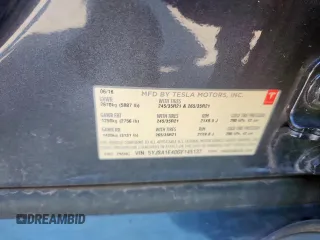 2016 Tesla Model S 90D z VIN 5YJSA1E40GF145137, wystawiony jako Copart lot #62027605 z przebiegiem 92 060 mil mil oraz Szkoda całkowita • Salvage title. Historia ofert i sprzedaży dostępna na DreamBid. Obrazek 12.