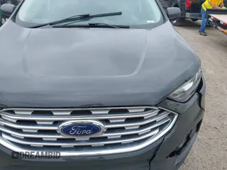 2021 Ford Edge SE with VIN 2FMPK4G97MBA50768, listed as a IAAI auction lot 42748557 with 89,523 mi miles and . Bid and sale history available at DreamBid. Image 11.