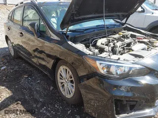 2017 Subaru Impreza Premium with VIN 4S3GTAD65H3716428, listed as a IAAI auction lot 41942299 with 77,181 mi miles. Bid and sale history available at carsss.com. Image 6.