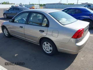 2001 Honda Civic LX with VIN 2HGES16541H509564, listed as a IAAI auction lot 42121423 with 129,561 mi miles. Bid and sale history available at carsss.com. Image 3.