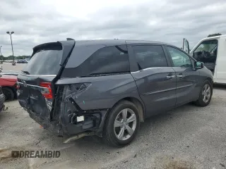 2019 Honda Odyssey EX with VIN 5FNRL6H50KB028595, listed as a Copart auction lot 65846434 with 77,596 mi miles and Salvage title. Bid and sale history available at DreamBid. Image 3.