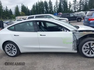 2023 Tesla Model 3 z VIN 5YJ3E1EA9PF431356, wystawiony jako IAAI lot #42620155 z przebiegiem 101 626 mil mil oraz . Historia ofert i sprzedaży dostępna na DreamBid. Obrazek 14.