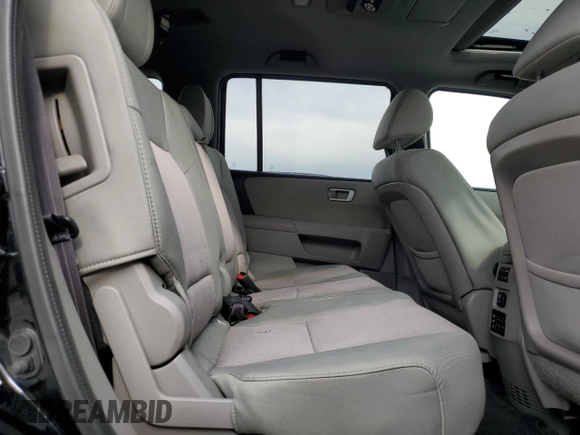 2015 Honda Pilot SE z VIN 5FNYF4H33FB074515, wystawiony jako Copart lot #54758015 z przebiegiem 148 493 mil mil oraz Szkoda całkowita • Salvage title. Historia ofert i sprzedaży dostępna na DreamBid. Obrazek 11.