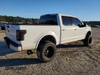 2015 Ford F-150 XLT with VIN 1FTEW1EP9FFC91698, listed as a Copart auction lot 87816535 with 127,459 mi miles and Salvage Title. Bid and sale history available at DreamBid. Image 3.