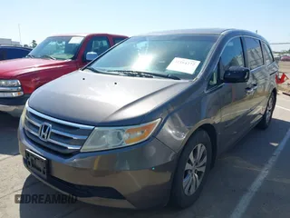 2012 Honda Odyssey EX-L with VIN 5FNRL5H65CB012428, listed as a IAAI auction lot 42164272 with 256,253 mi miles and . Bid and sale history available at carsss.com. Image 2.