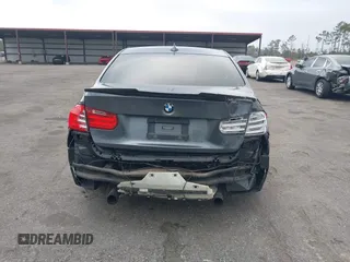 2014 BMW 3 Series 335i with VIN WBA3A9C56EF479564, listed as a IAAI auction lot 41578397 with 136,637 mi miles. Bid and sale history available at carsss.com. Image 16.