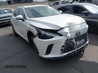 2023 Lexus RX 350 z VIN JTJCHMAA9P2003107, wystawiony jako IAAI lot #42332264 z przebiegiem 34 723 mil mil oraz . Historia ofert i sprzedaży dostępna na DreamBid. Obrazek 1.