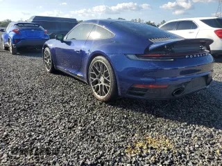 2021 Porsche 911 Carrera with VIN WP0AA2A97MS206873, listed as a Copart auction lot 77359214 with 1,036 mi miles and Salvage Title. Bid and sale history available at carsss.com. Image 2.