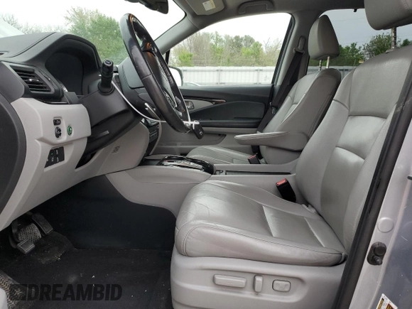 2017 Honda Pilot Touring z VIN 5FNYF6H92HB006855, wystawiony jako Copart lot #53650655 z przebiegiem 130 732 mil mil oraz Szkoda całkowita • Salvage title. Historia ofert i sprzedaży dostępna na DreamBid. Obrazek 7.