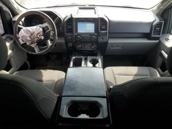 2018 Ford F-150 XL с VIN 1FTEW1CG6JKE34321, выставлен на аукционе Copart как лот 62852195 с пробегом 174 966 миль миль и Списание • Salvage title. История ставок и продаж доступна на DreamBid. Изображение 8.