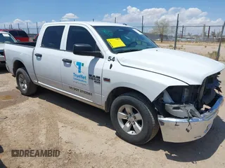 2020 Ram 1500 Tradesman z VIN 3C6RR6KT6LG134123, wystawiony jako IAAI lot #42429665 z przebiegiem 101 511 mil mil oraz . Historia ofert i sprzedaży dostępna na DreamBid. Obrazek 1.