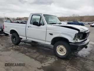 1996 Ford F-150 with VIN 1FTEF14Y2TLA02667, listed as a Copart auction lot 49686735 with 143,197 mi miles and Clean title. Bid and sale history available at DreamBid. Image 4.