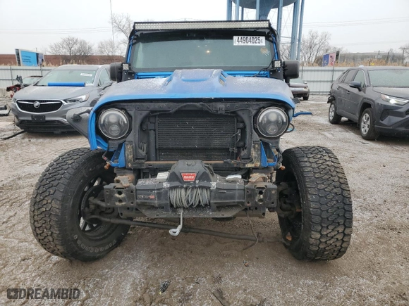 2015 Jeep Wrangler Unlimited Sahara with VIN 1C4BJWEGXFL526853, listed as a Copart auction lot 44904025 with 110,110 mi miles and Salvage Title. Bid and sale history available at carsss.com. Image 5.
