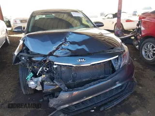 2020 Kia Optima LX with VIN 5XXGT4L34LG410127, listed as a IAAI auction lot 41335079 with 108,040 mi miles. Bid and sale history available at carsss.com. Image 6.