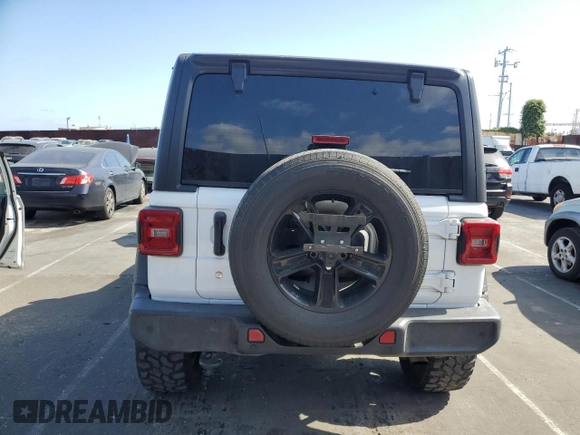 2019 Jeep Wrangler Unlimited Sport Altitude with VIN 1C4HJXDG2KW675235, listed as a Copart auction lot 54389785 with 88,825 mi miles and Salvage title. Bid and sale history available at DreamBid. Image 6.