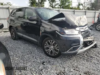 2018 Mitsubishi Outlander ES with VIN JA4AD2A34JZ006680, listed as a Copart auction lot 59897555 with 56,709 mi miles and Salvage title. Bid and sale history available at DreamBid. Image 4.
