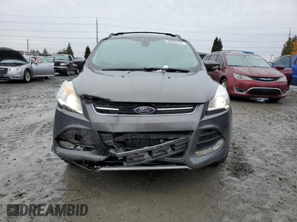 2015 Ford Escape Titanium with VIN 1FMCU9J92FUA62323, listed as a Copart auction lot 85826724 with 108,315 mi miles and Salvage Title. Bid and sale history available at DreamBid. Image 5.