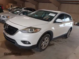 2014 Mazda CX-9 Touring with VIN JM3TB2CA8E0430199, listed as a IAAI auction lot 42090612 with 188,412 mi miles and . Bid and sale history available at carsss.com. Image 2.