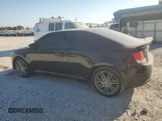 2012 Scion tC z VIN JTKJF5C73C3034583, wystawiony jako Copart lot #74317714 z przebiegiem 163 158 mil mil oraz Czysty tytuł • Clean title. Historia ofert i sprzedaży dostępna na DreamBid. Obrazek 2.