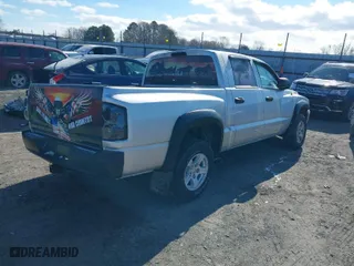 2006 Dodge Dakota SLT with VIN 1D7HE48N76S640351, listed as a IAAI auction lot 41121248 with 155,463 mi miles. Bid and sale history available at carsss.com. Image 4.