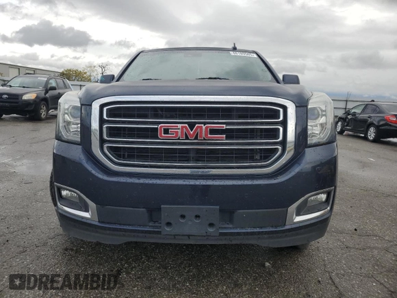 2017 GMC Yukon SLT with VIN 1GKS1BKC5HR295827, listed as a Copart auction lot 48189565 with 106,867 mi miles and Salvage Title. Bid and sale history available at carsss.com. Image 5.