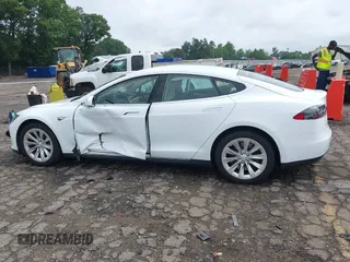 2016 Tesla Model S 70 with VIN 5YJSA1E11GF132984, listed as a IAAI auction lot 42428634 with Not provided miles and . Bid and sale history available at DreamBid. Image 13.