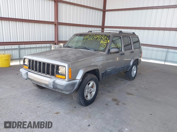 2000 Jeep Cherokee z VIN 1J4FF48S1YL273555, wystawiony jako IAAI lot #42249135 z przebiegiem 184 674 mil mil oraz . Historia ofert i sprzedaży dostępna na DreamBid. Obrazek 2.